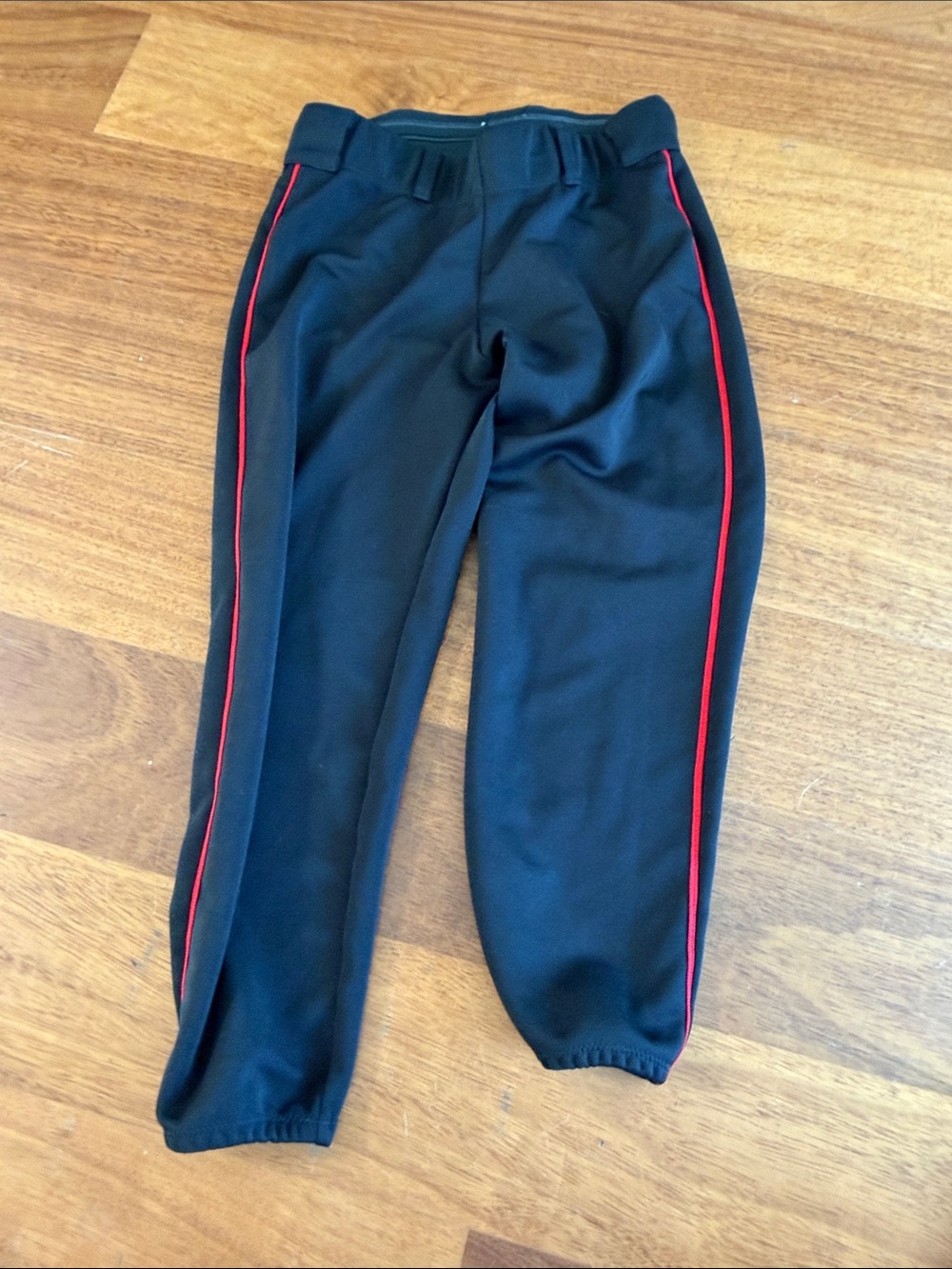 The Gluv softball pants with Red piping